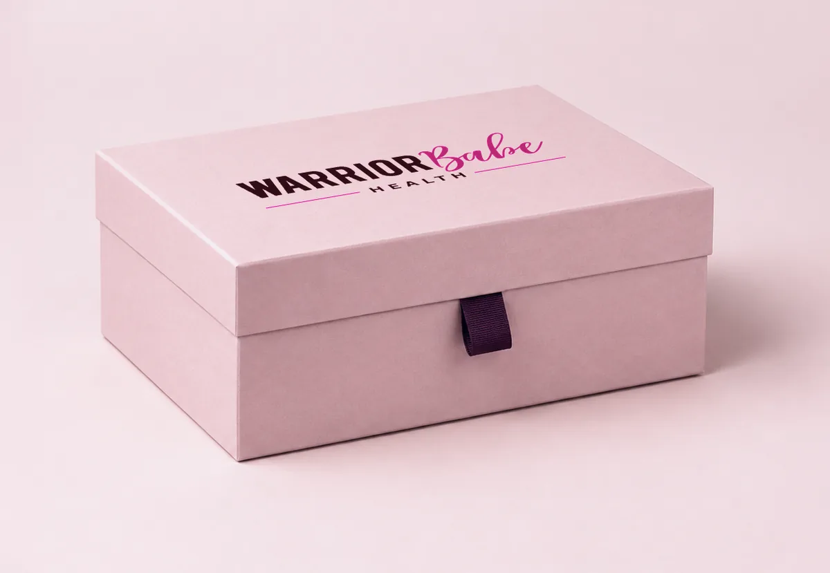 A closed pink WarriorBabe Health shipping box